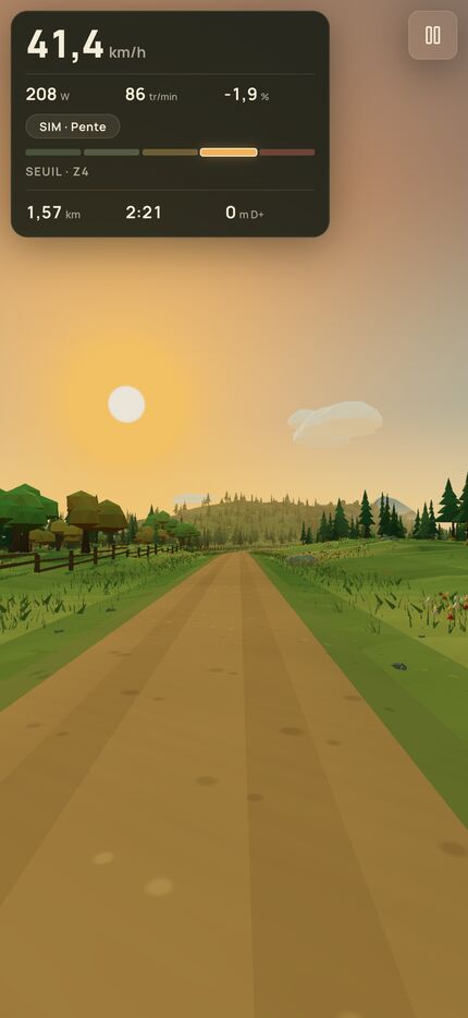 Le jeu en portrait sur iPhone : la route occupe le bas de l’écran, l’horizon boisé au loin.